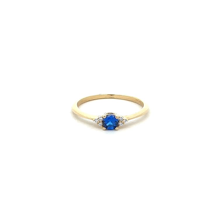 detail Zlatý Prsten s Modrým Kamenem