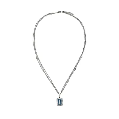 Zářivý Akvamarín Obklopený Diamanty v Luxusním Šperku