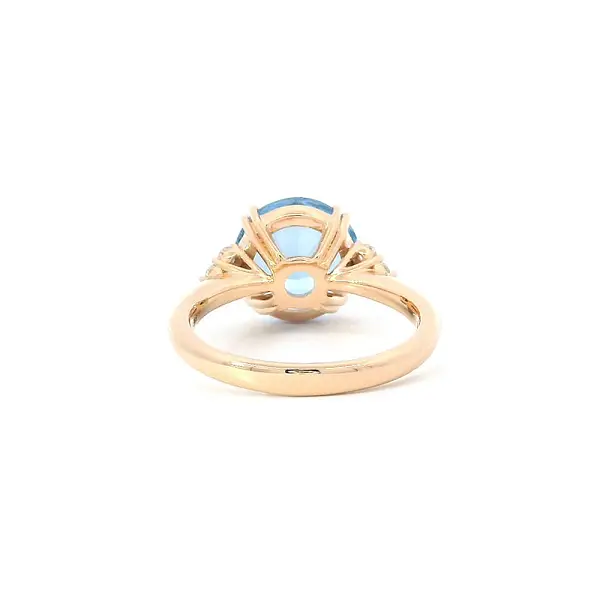 Luxusní Prsten s Modrým Topazem a Diamanty v Růžovém Zlatě