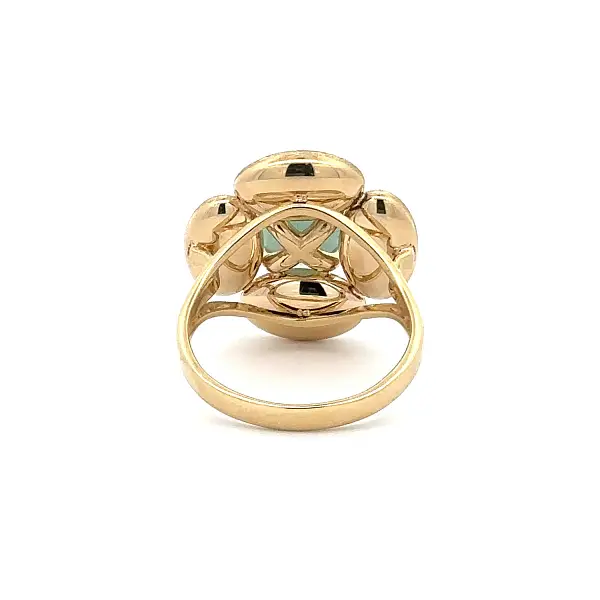 Gold ring with cushion-cut aquamarine