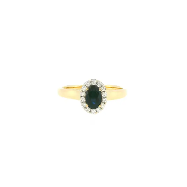 Gold ring with 0.50 ct sapphire in a diamond halo