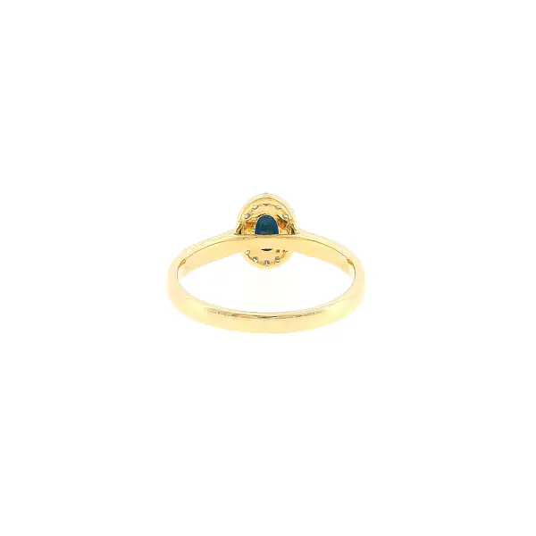 Gold ring with 0.50 ct sapphire in a diamond halo
