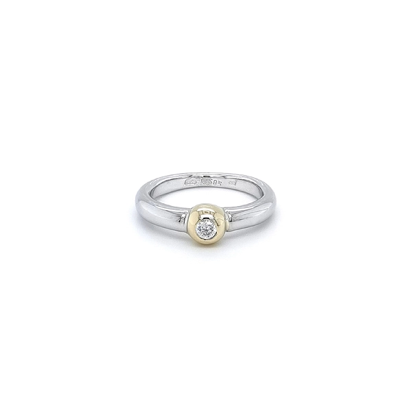 Ring with Zircon made of Combination Gold