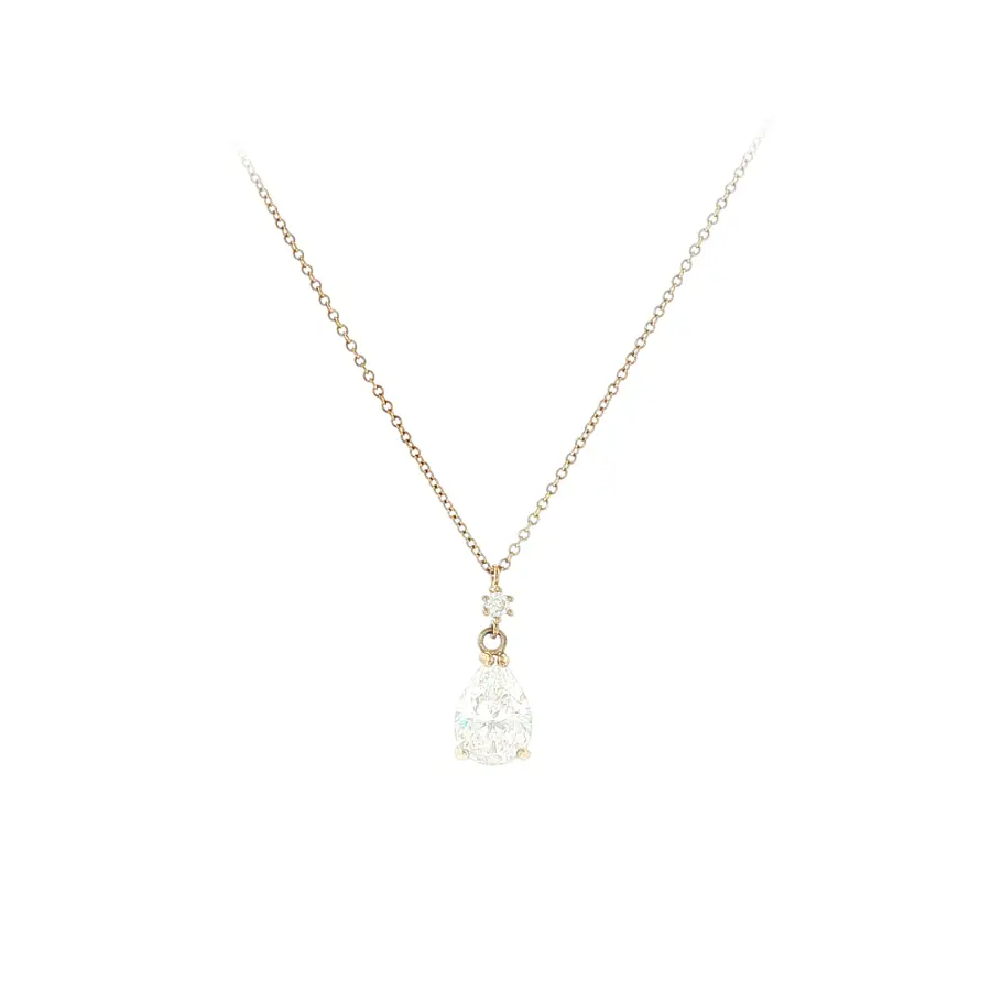 Delicate gold necklace with a teardrop zircon