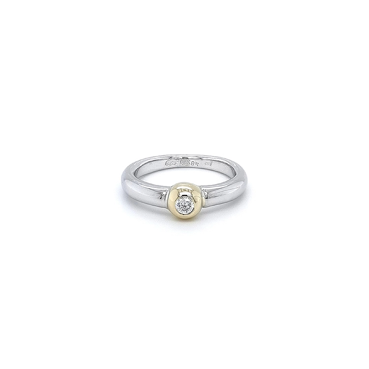 Ring with Zircon made of Combination Gold